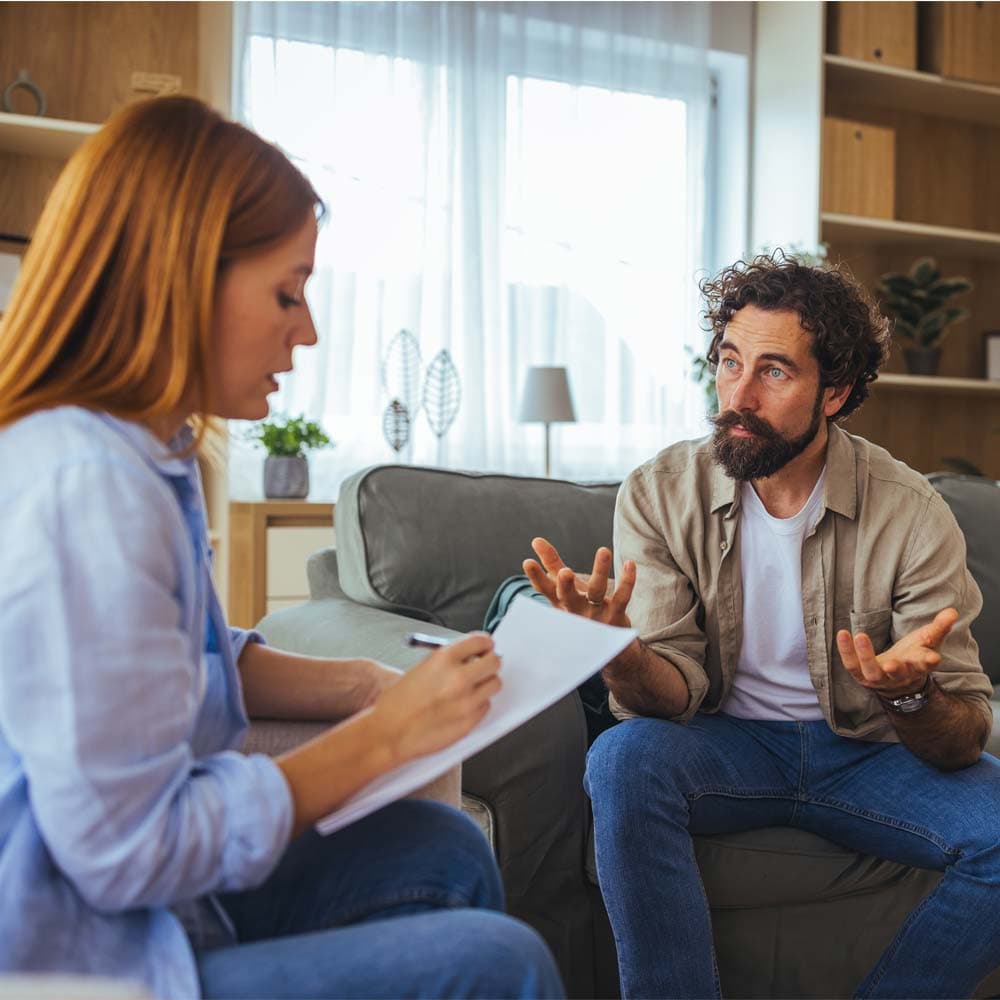 a man attending an addiction program with therapy sessions