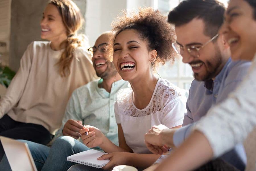 people sitting in a circle during a group therapy session