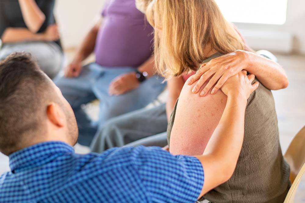 a counselor and client working through a DBT skill together