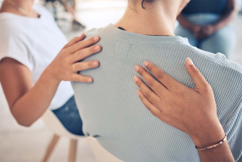 addiction-treatment-support a woman being supported by her peers in addiction treatment