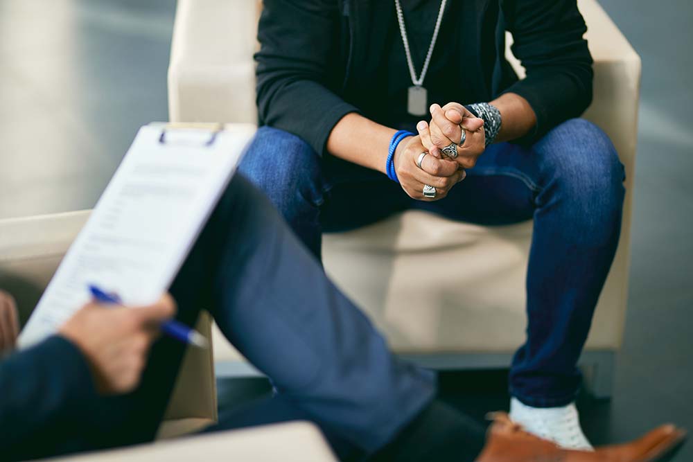 cbt-session a man talking to his therapist in a CBT session