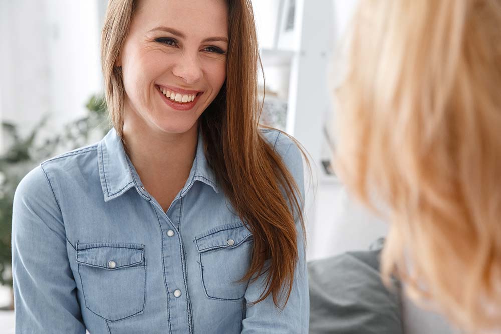 a happy cocaine addiction patient attending therapy