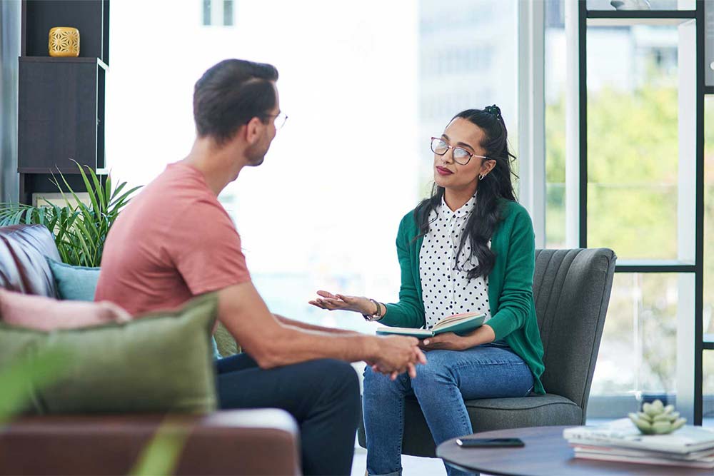explaining-php a therapist explaining the benefits of PHP